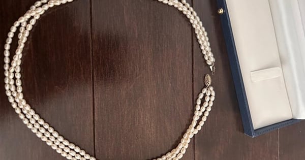 Multi-Strand Pearl Necklace with Decorative Clasp